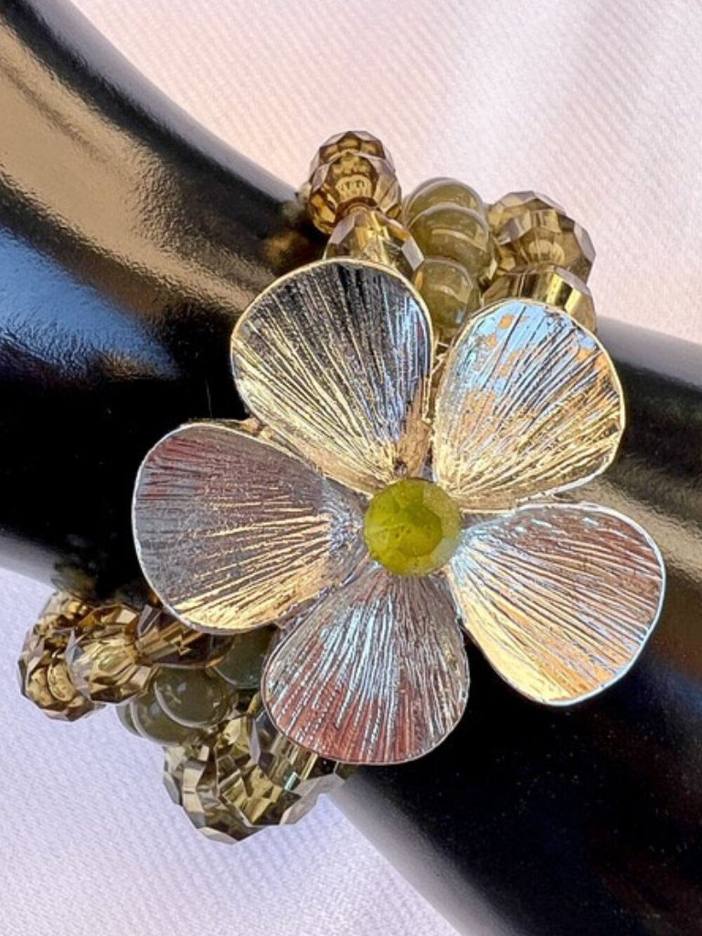 Silver Flower Bead Stretch Bracelet with Olive Center